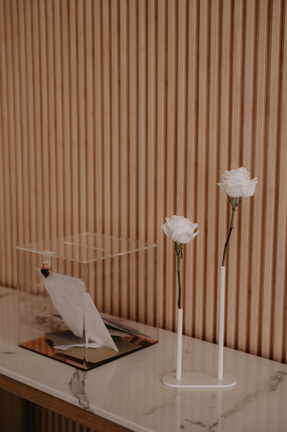 wedding wishing well with white flowers