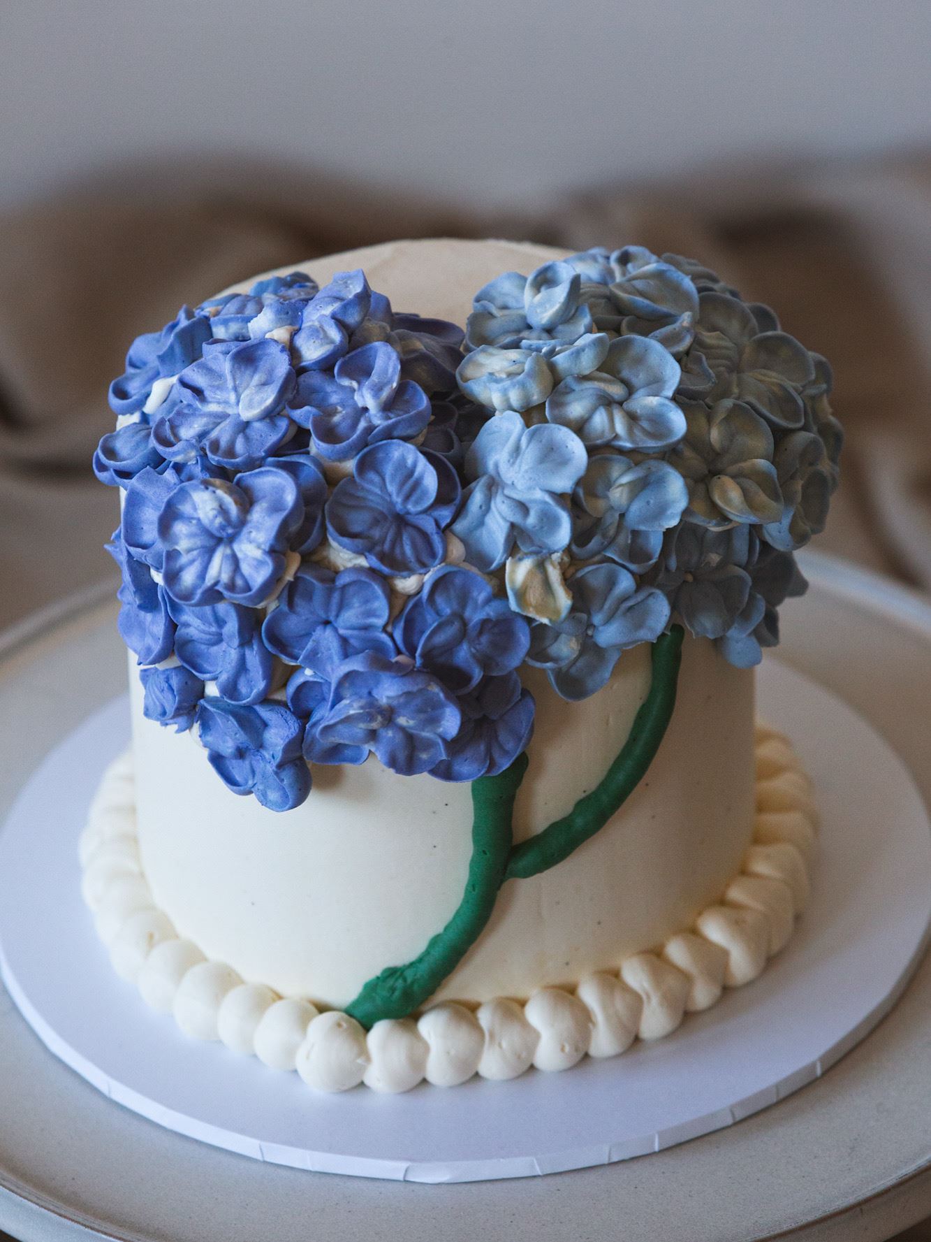 something blue cake with florals