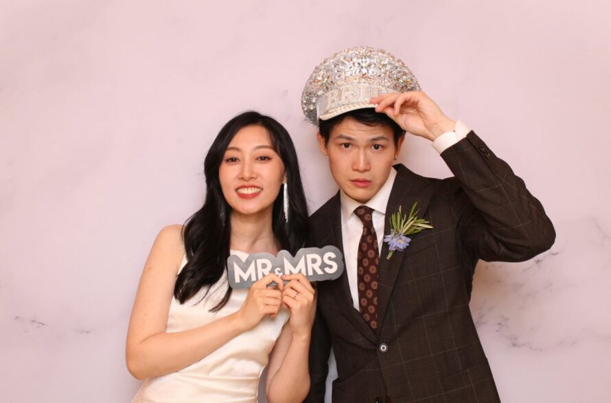 photo booth at a wedding with bride and groom