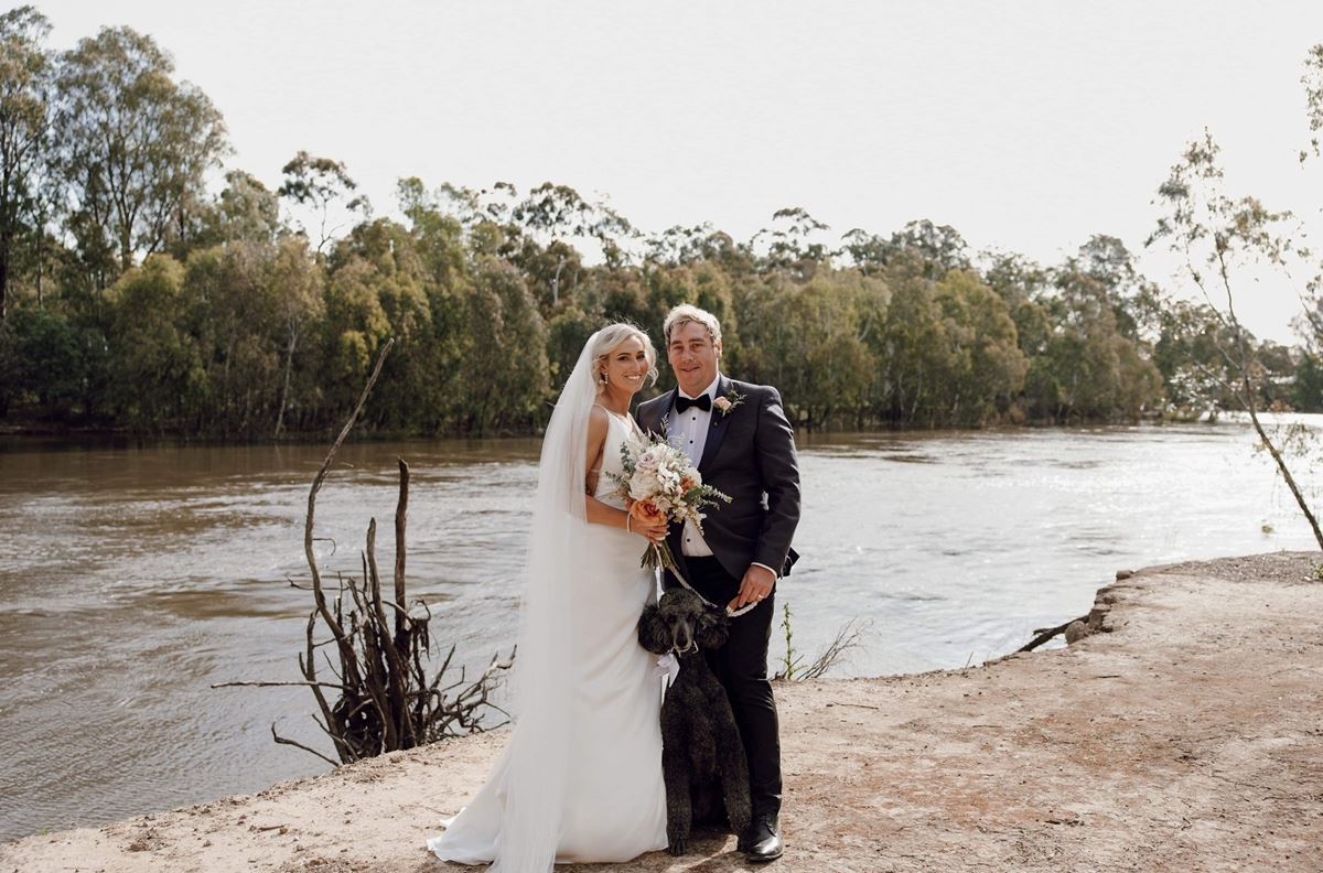 bride groom and dog on the murray