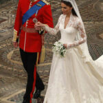 Prince William and his bride Kate, hold hands during their wedding service in Westminster Abbey in London