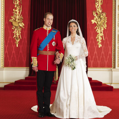 Prince William and his bride Kate, hold hands during their wedding service in Westminster Abbey in London