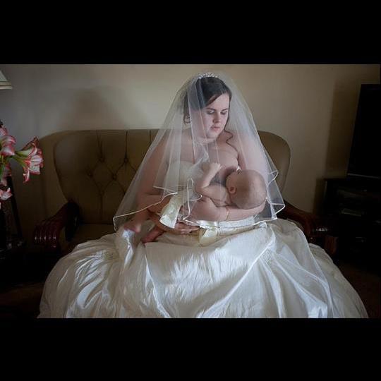 Jo-Hanna Gordon breastfeeding her son Andy on her wedding day. Image: Margan Photography