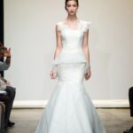 Hayley Paige's mini wedding dress, Kiki, features an ombre pleated peplum