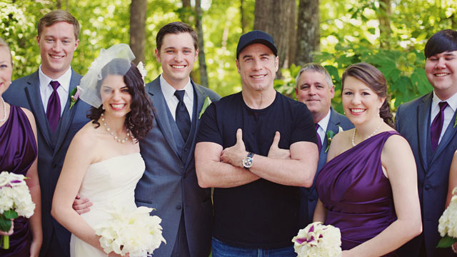 John Travolta takes centre stage in the wedding photos