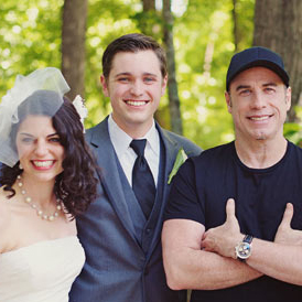 John Travolta takes centrestage in the wedding photos