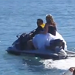 Cairns bride Bree Hargreaves didn’t have to worry about what song she would play when going down the aisle because she would be serenaded by the sound of crashing waves – as she jet-skied into her wedding ceremony!