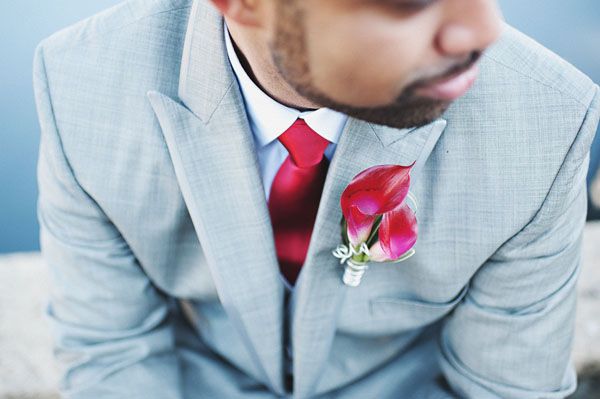 groom in red outfit