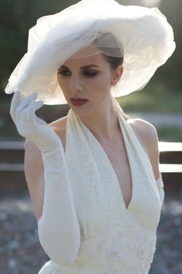 Wide brimmed hats needn't be tacky. This exquisite hat is a simple affair that has a big impact.