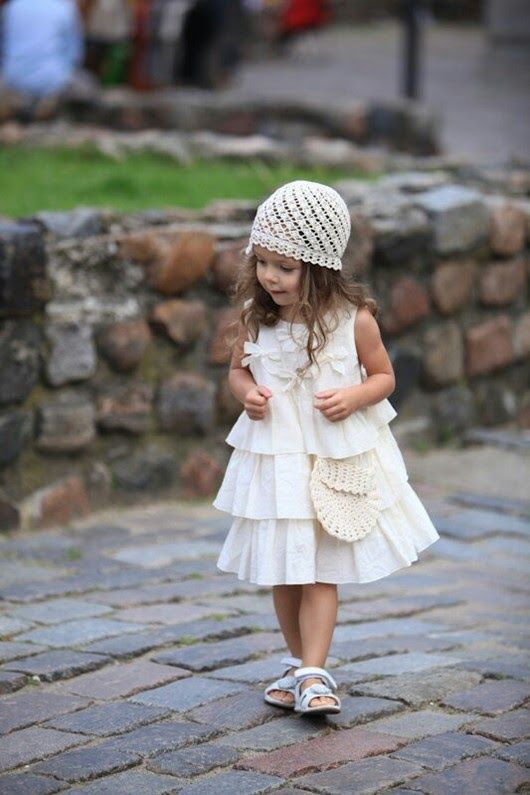 Flower girl in a crocheted cap