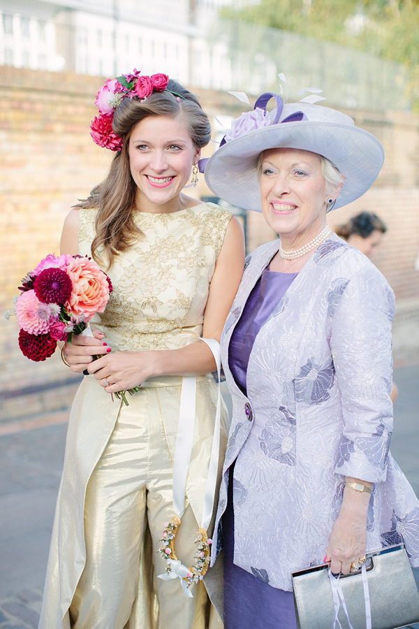 Golden wedding gown with trousers. Image: Camilla Arnhold Photography