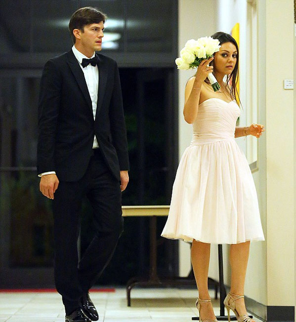 Ashton Kutcher and Mila Kunis at Mila's brother's wedding. Image: Jackson Lee/Splash News