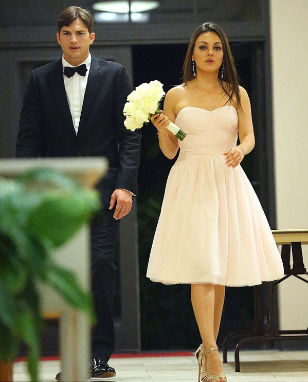 Ashton Kutcher and Mila Kunis at Mila's brother's wedding. Image: Jackson Lee/Splash News
