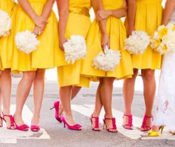 bridesmaids wearing yellow dresses and pink shoes