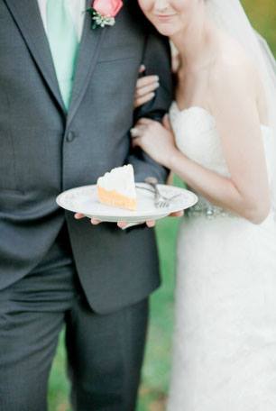 bride and groom with cake