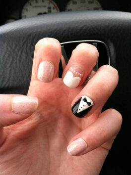 wedding nails with a dress and tuxedo painted