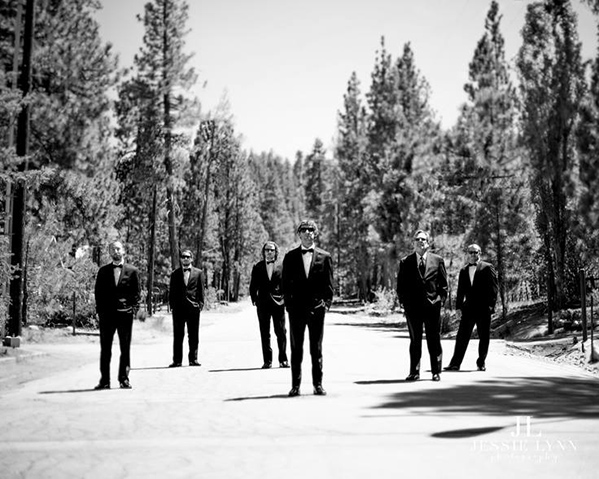groom and groomsmen black and white photo