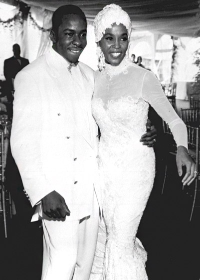 Whitney Houston and Bobby Brown on their wedding day in July 1992