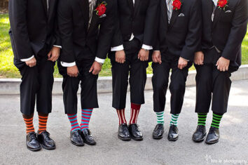 groomsmen wearing colorful socks