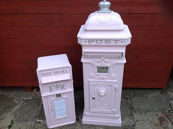 pink English postboxes at wedding 