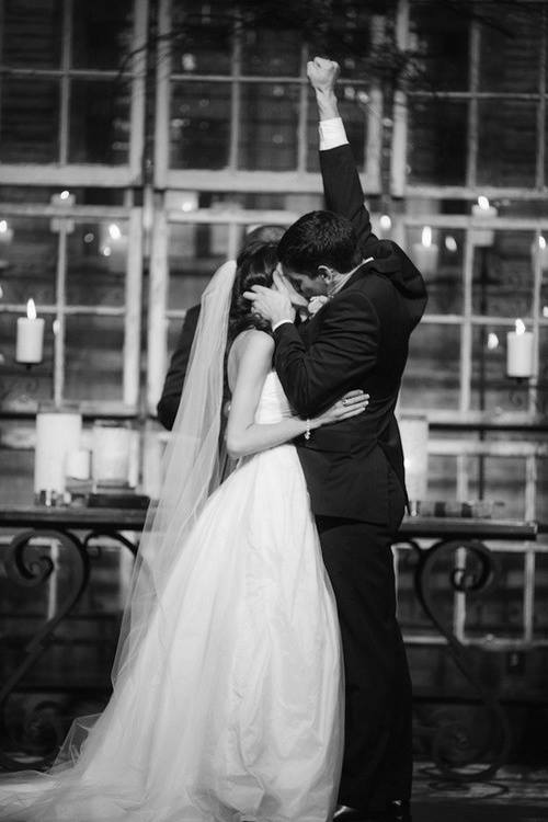 bride and groom kissing