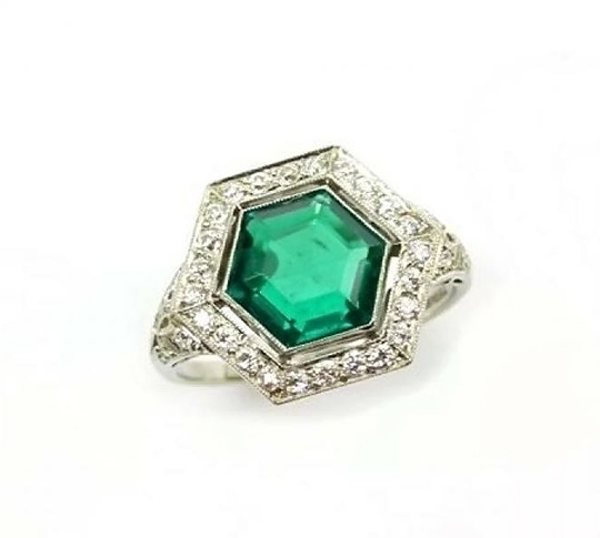 wedding ring with a hexagonal emerald