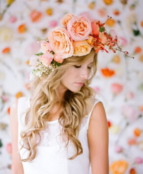bride with orange roses in her hair