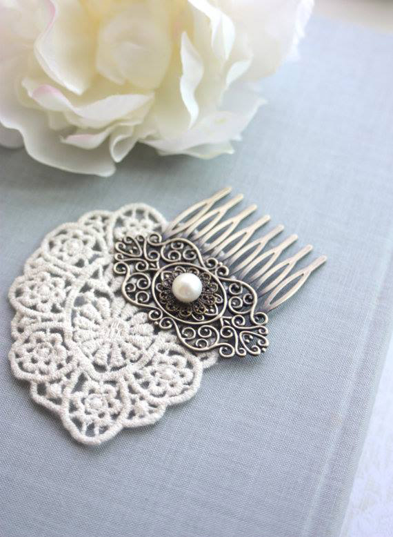 haircomb with freshwater pearl attached to it