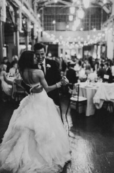 black and white photo of a wedding couple dancing