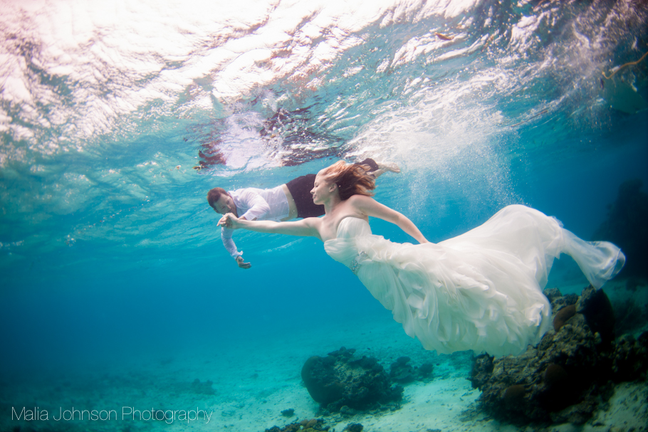 Shari and Trav decided to have an underwater Trash the dress shoot in Fiji. Image: Malia Johnson Photography