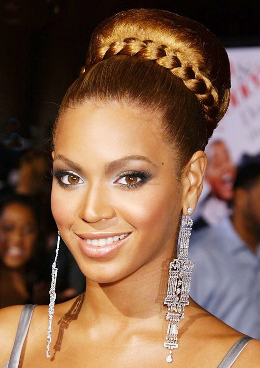 The mighty Beyonce rocks a not-so-classic ballet bun because it's tied with a gorgeous braid. Image: Glamour Magazine UK