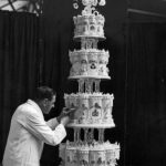 Standing nine feet high, the Queen's four-tiered wedding cake was made from ingredients sent by the Australian Girl Guides