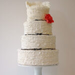 Also by Camille Styles, this cake adds elegance to an often informal icing style