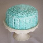Ruffle cakes can be made to match any colour scheme as seen here in this cute cake by Cullinan Cakes