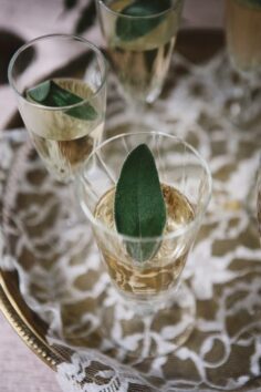 wedding champers with a leaf of sage