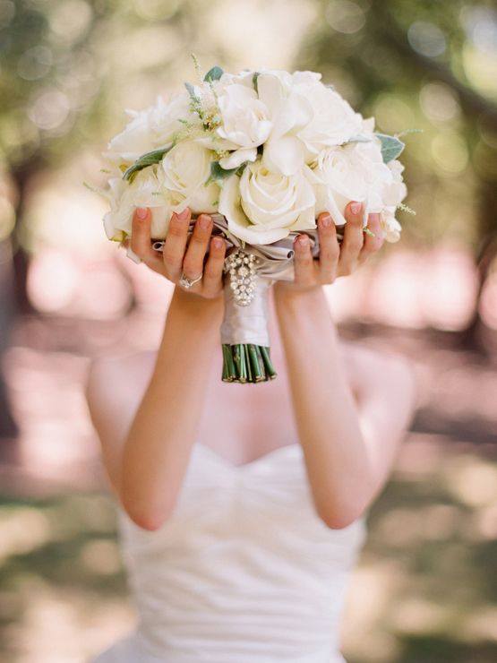 a bride holding the wedding bouquet