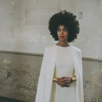 The bride Solange Knowles in her stunning pantsuit and cape. Image by Rog Walker