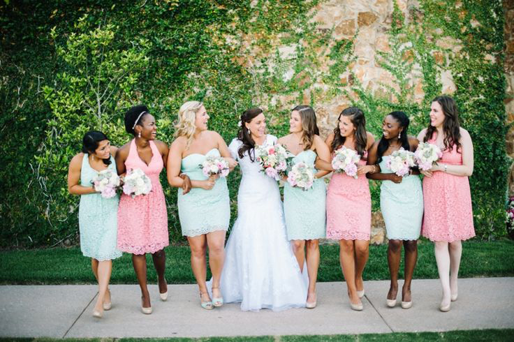 bride and bridesmaids in mint green and pink