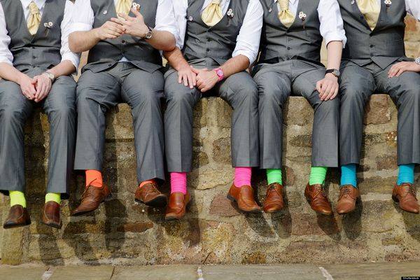 Groomsmen wearing colourful socks
