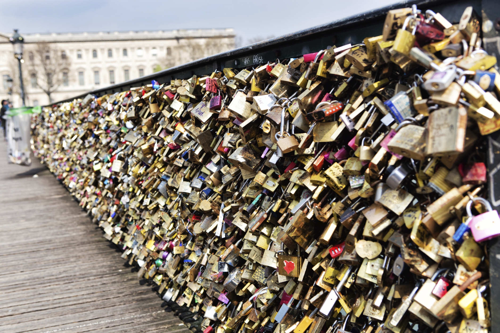 Couples across the globe attach padlocks containing their names to bridges. 