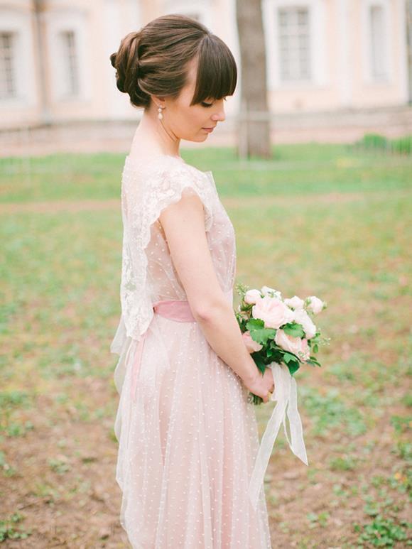 Lace wedding gown by Tanya Kochnova