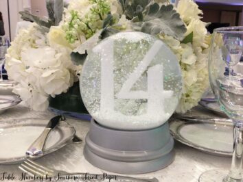 Wedding table numbers in snow globes