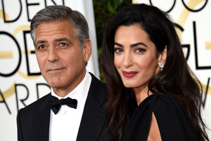 George Clooney and wife Amal arrive at the Golden Globe awards on January 11, 2015. Image: Getty Images