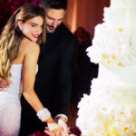Sofia and Joe cut their extravagant wedding cake during their wedding celebrations. Image Sofia Vergara via Instagram