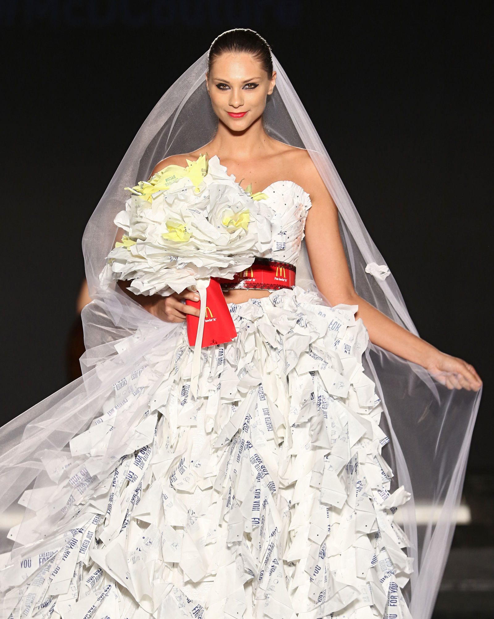 A wedding dress made from McDonald's wrappers! Image: Getty/Alexander Tamargo