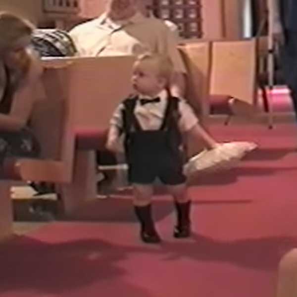 cute-ring-bearer-throws-ring-pillow