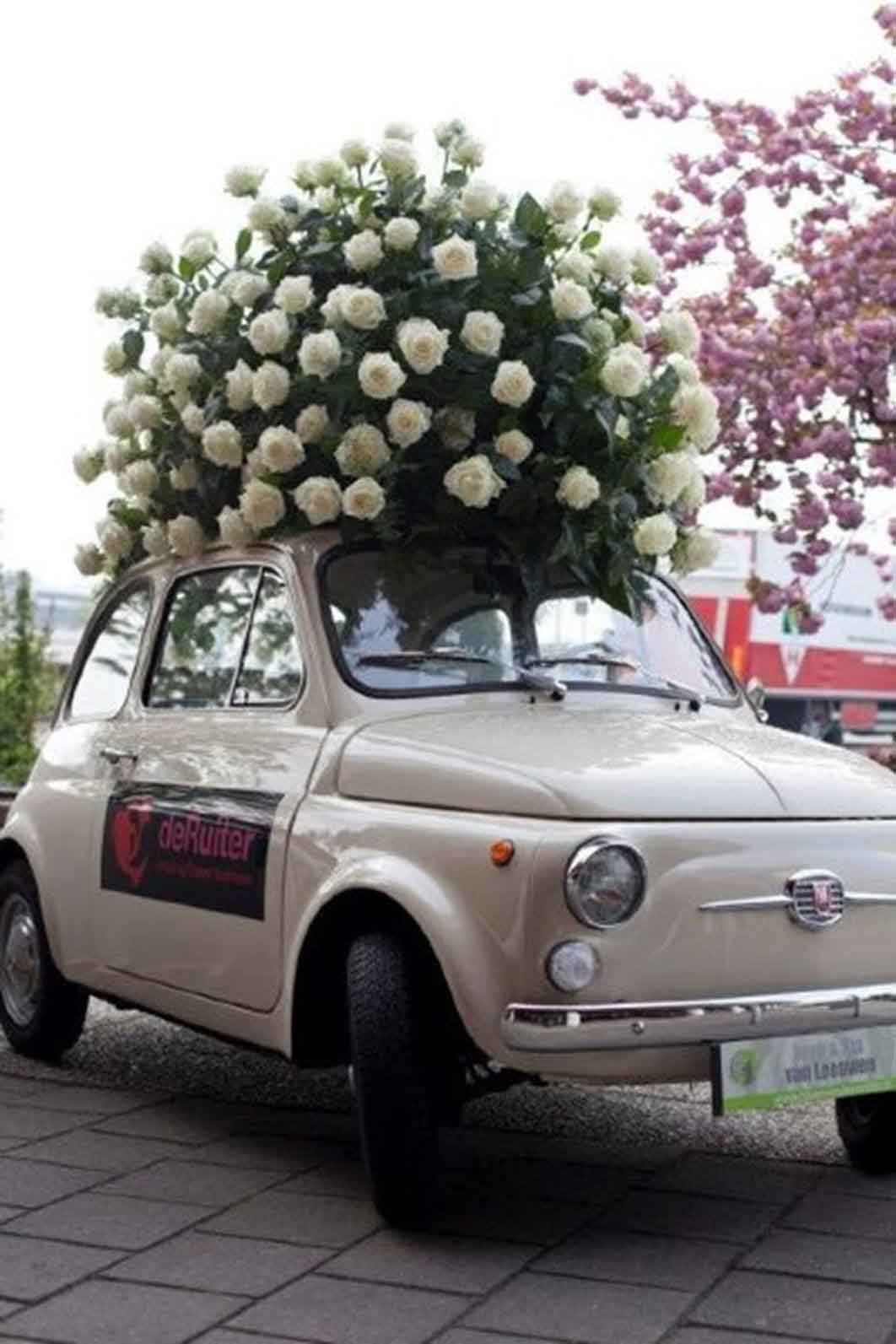 Wedding flowers on a car