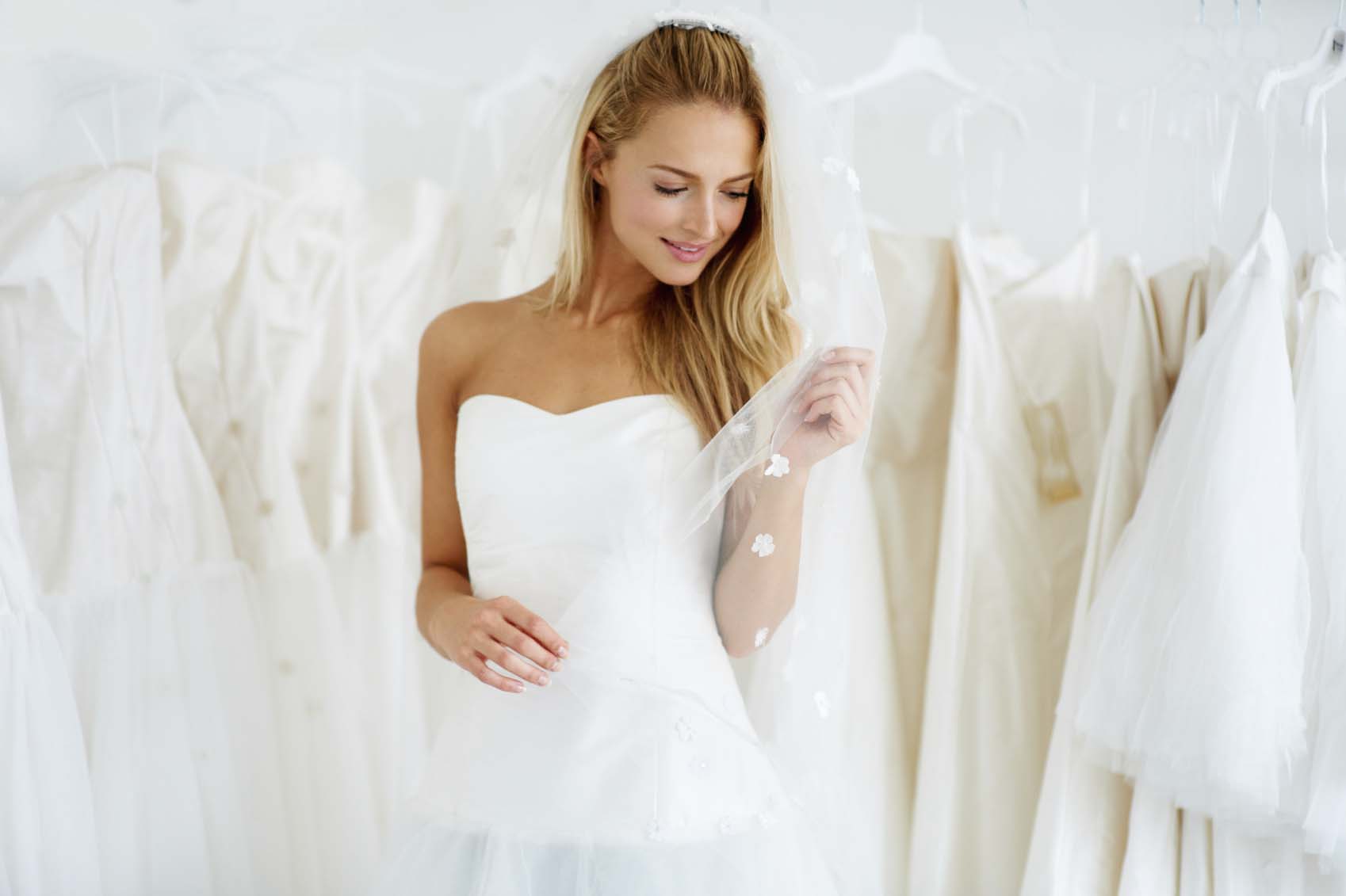 bride having her wedding dress custom made