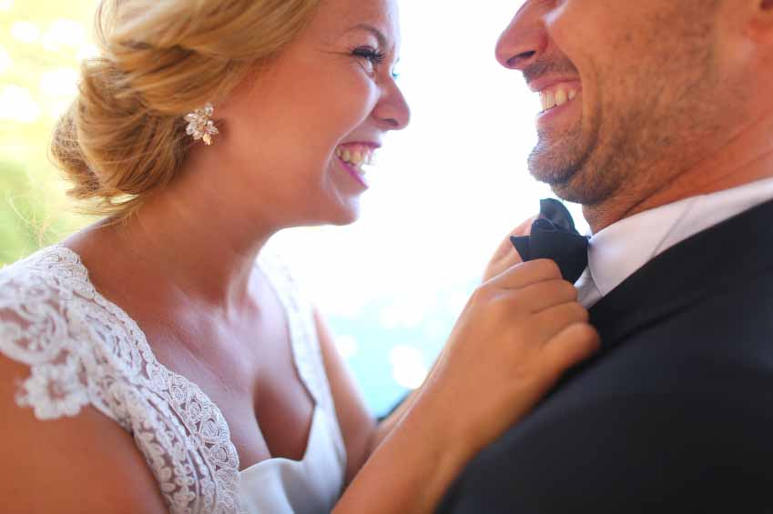 bride and groom laughing