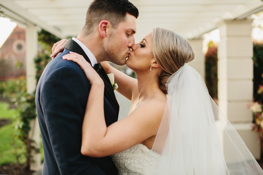 bride and groom kissing